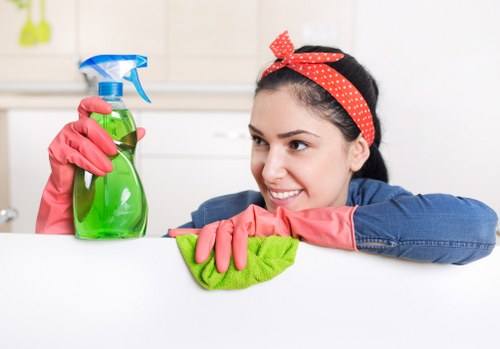 Careful sorting of household items during a Bermondsey house clearance